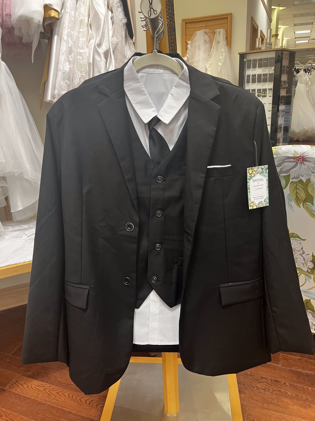 Boys' black three-piece formal suit with vest, shirt and tie, children's formal wear at Vallance Couture Ottawa
